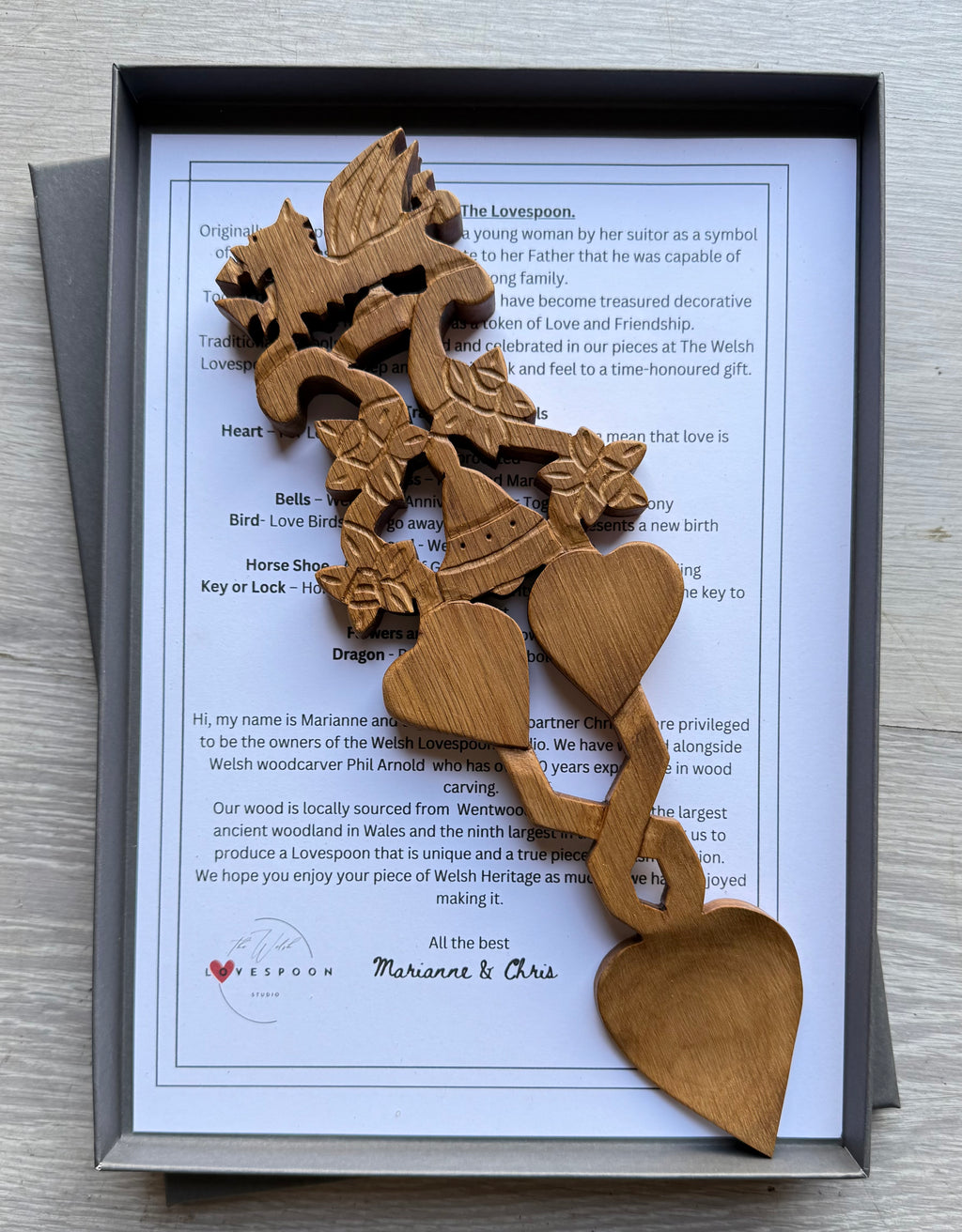 11 inch “Welsh Wedding” hand carved Lovespoon. Dragon, daffodils, wedding bells and hearts.